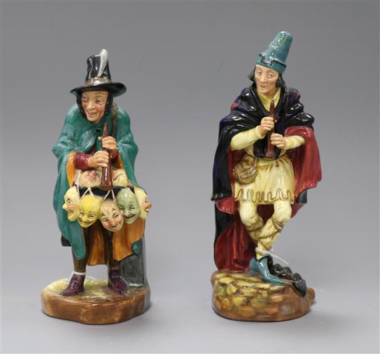 Two Royal Doulton figures: The Pied Piper HN2102 and The Mask Seller HN1493 tallest 23cm